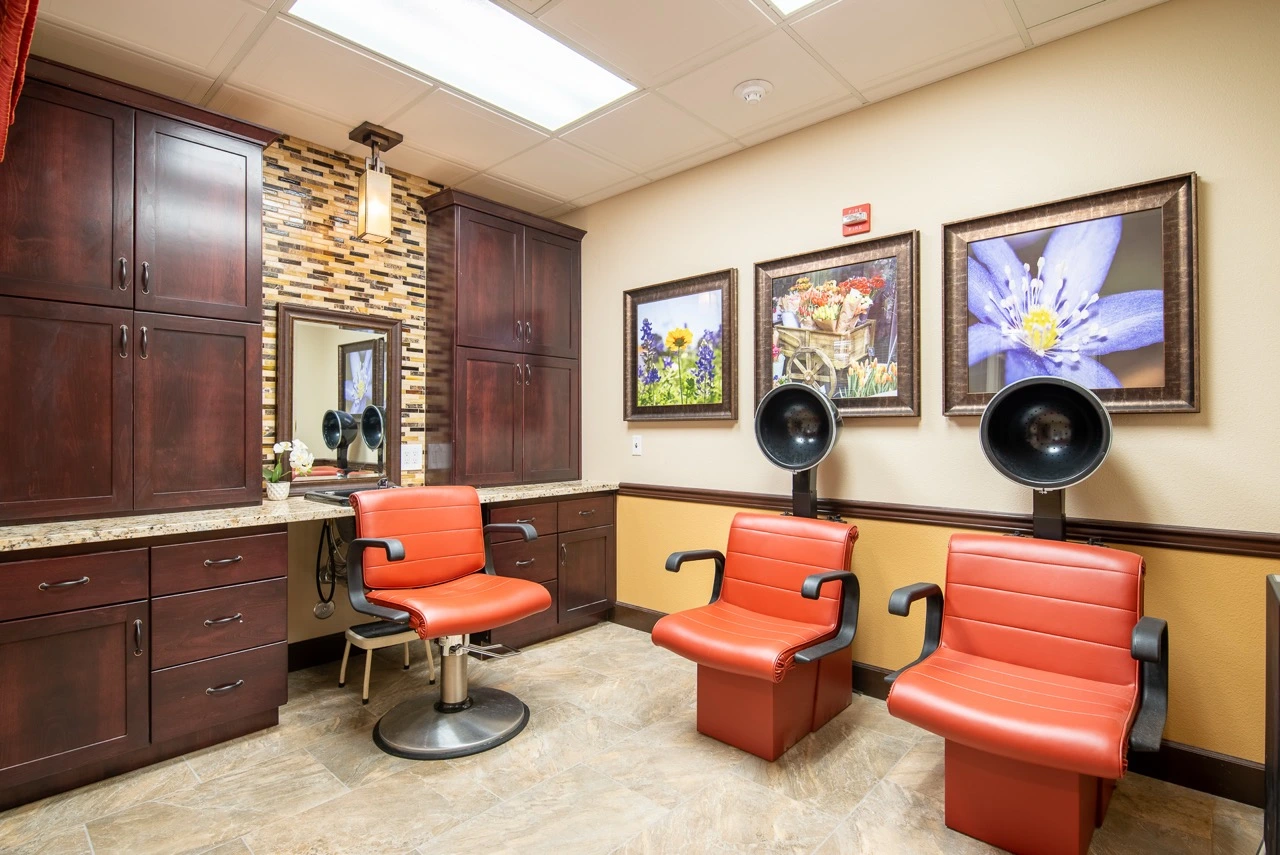 Healdsburg Salon Salon and spa with three red salon chairs